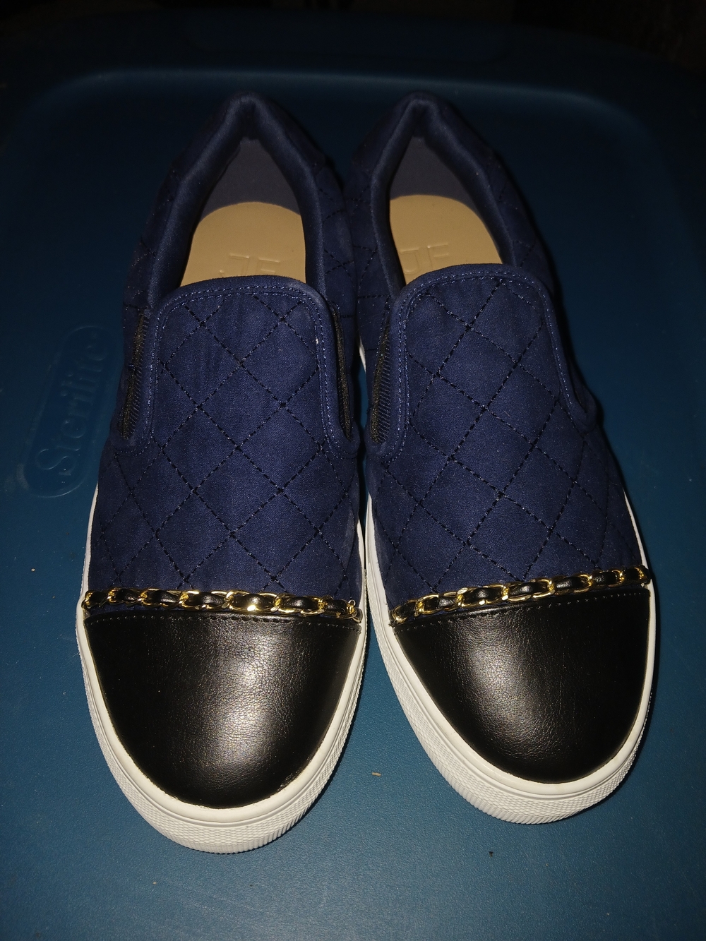 Quilted Navy Slip-On Loafers with Black Cap Toe and Gold Chain
